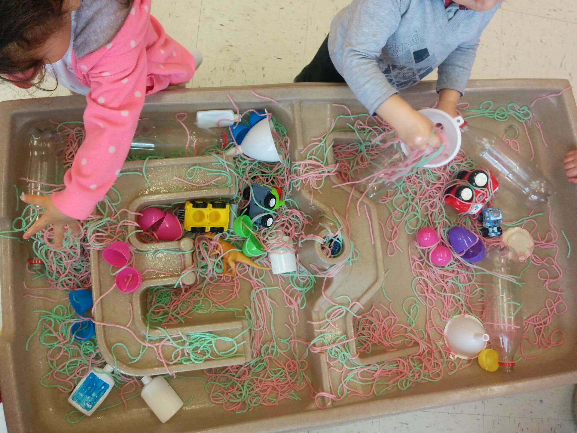 Playing with coloured spaghetti